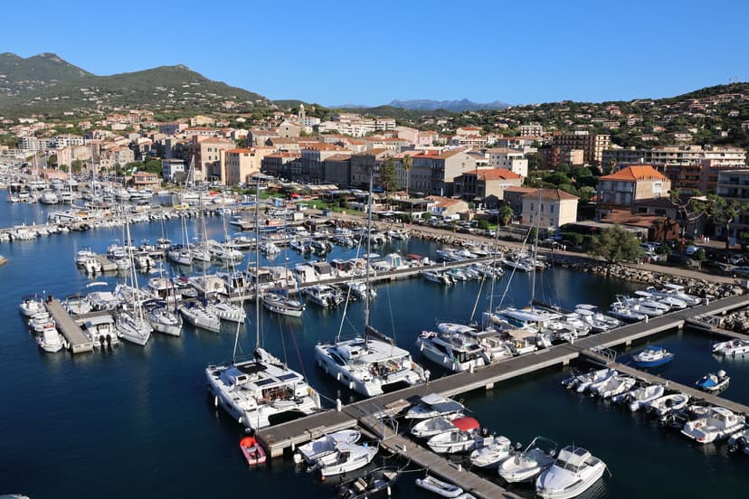 Porto-Vecchio marina with moored sailboats and yachts along the waterfront in Corsica