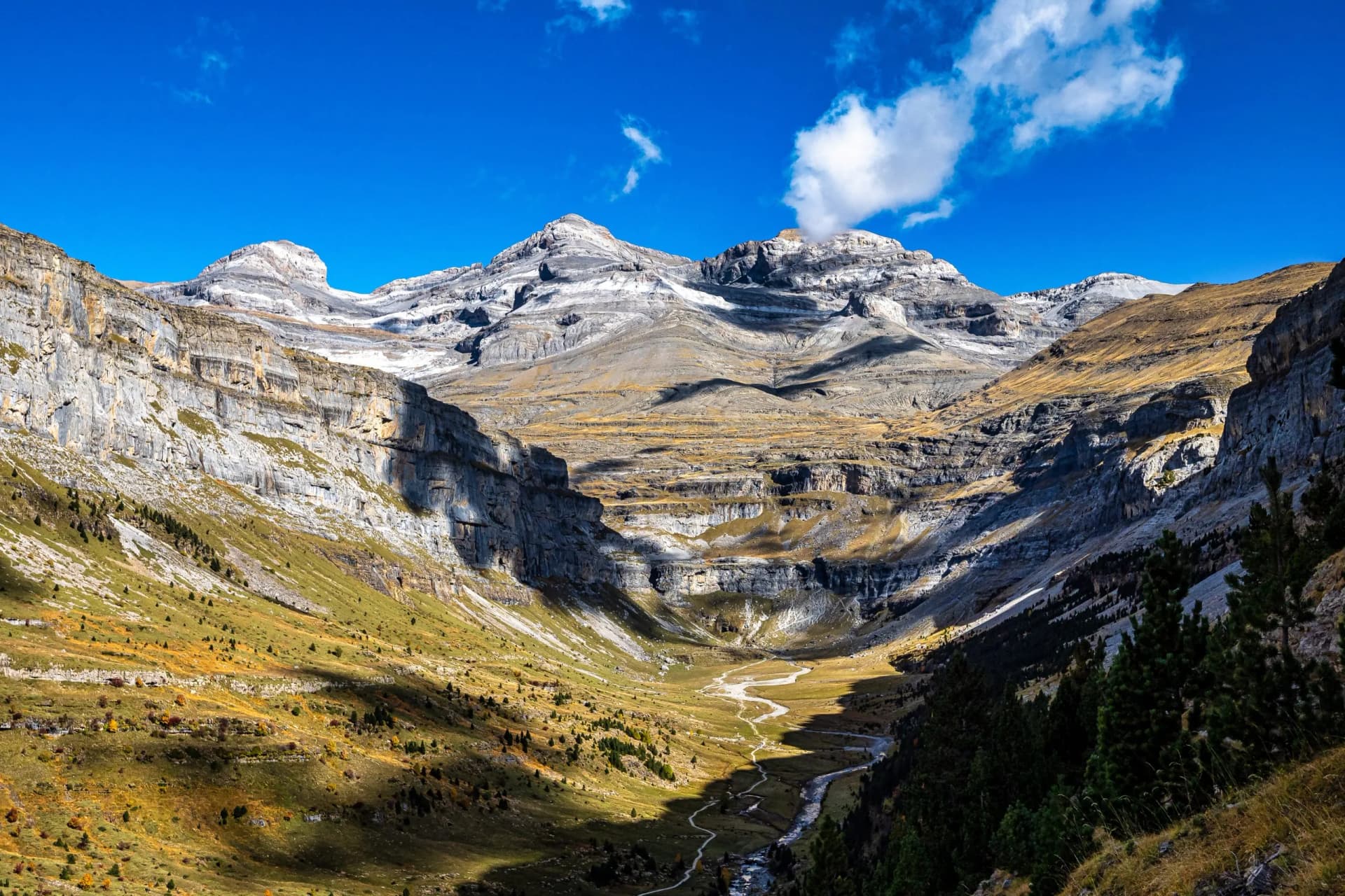 Autumn landscape view of massive cliffs and mountains in Ordesa and Monte Perdido National Park, Spain.