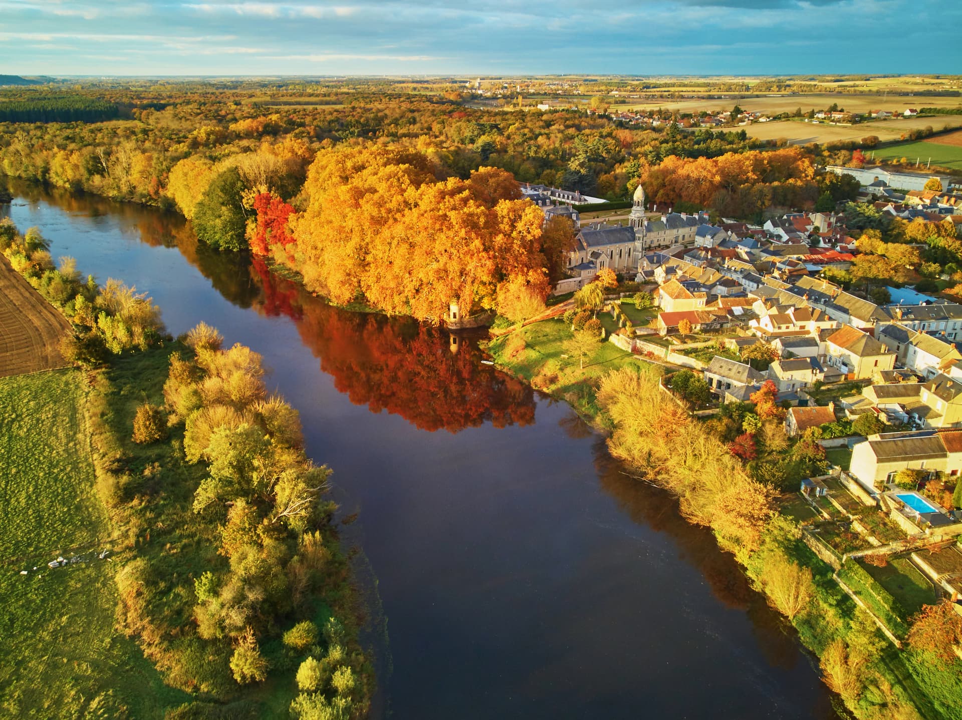 Autumn forest and river Vienne, France