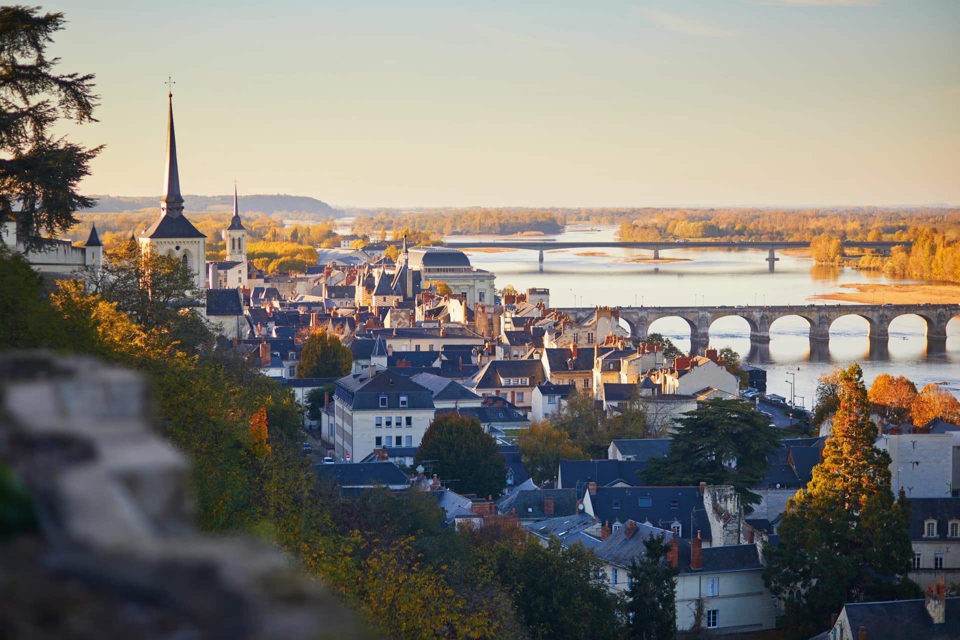 Scenic view of the Loire river with Cessart bridge in Saumur, Maine-et-Loire department, France