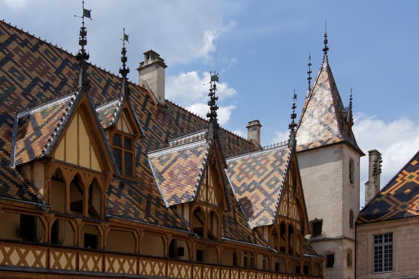 Hotel Dieu colorful patterned tile roofs and dormer windows in Beaune