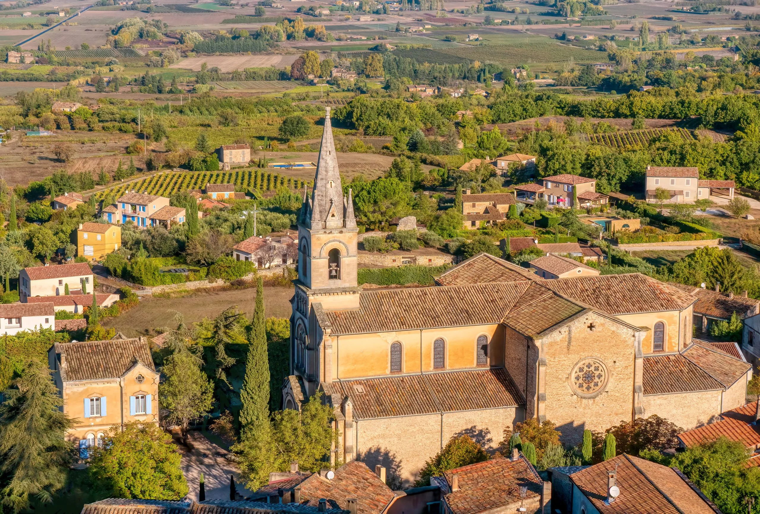 High angle view of the town's second, newer, 18th century church known as the Eglise Bas, in the picturesque village of Bonnieux in the Luberon region of Provence, France.